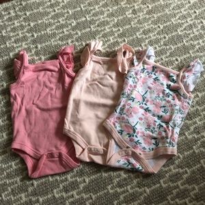 Never worn 3 pack baby girl onesies